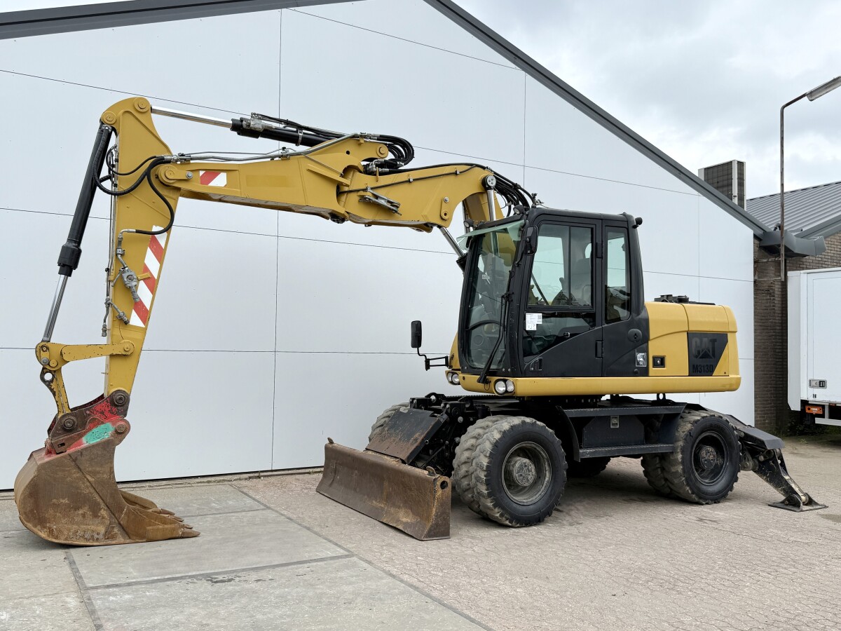 Caterpillar M313D 14 T 2010