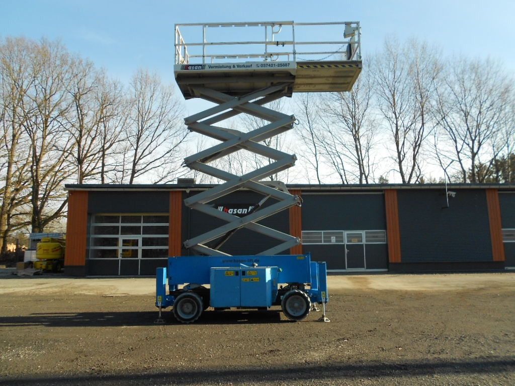 Scissor lift Genie GS4069BE 14 m 2015 Diesel